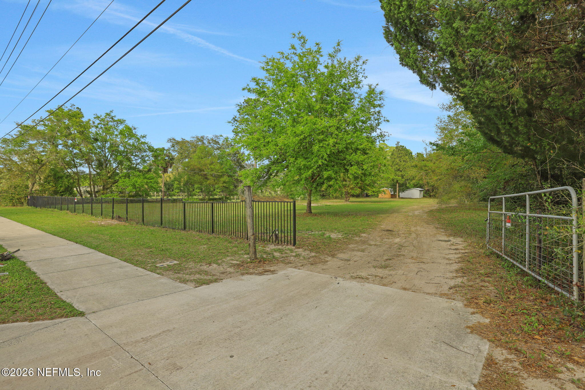 1133 Girvin Road Jacksonville, FL 32225 - Photo 5 of 69 a backyard of a house with lots of green space