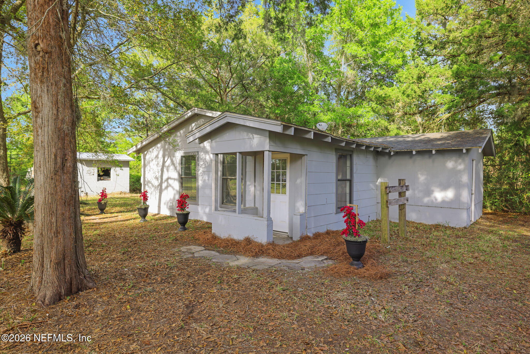 1133 Girvin Road Jacksonville, FL 32225 - Photo 10 of 69 a front view of a house with a garden