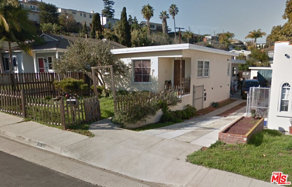 415 Campdell Street Playa del Rey, CA 90293 - Photo 8 of 10 a view of a house with a small yard and plants