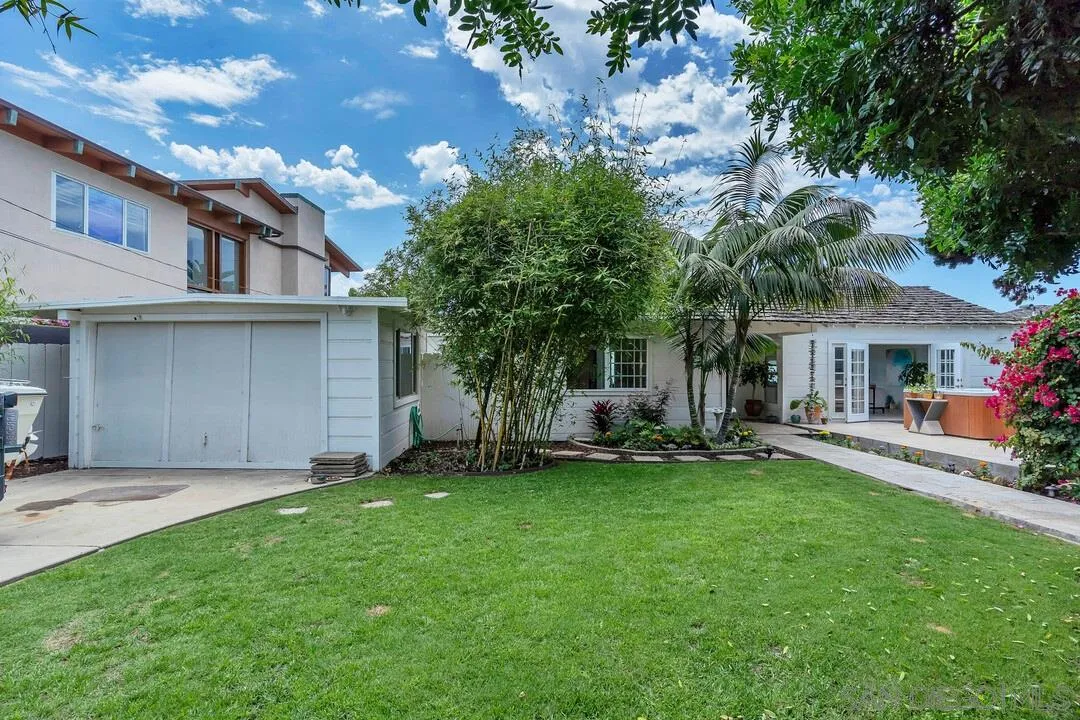 796 Neptune Avenue Encinitas, CA 92024 - Photo 12 of 49 a view of a house with a yard and sitting area