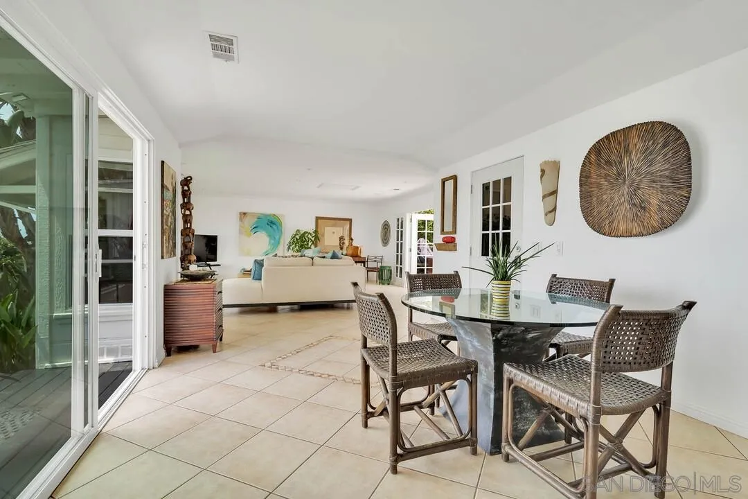 796 Neptune Avenue Encinitas, CA 92024 - Photo 23 of 49 a view of a dining room with furniture