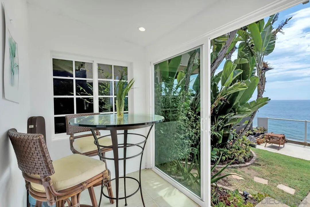 796 Neptune Avenue Encinitas, CA 92024 - Photo 34 of 49 a view of a chairs and table in a patio