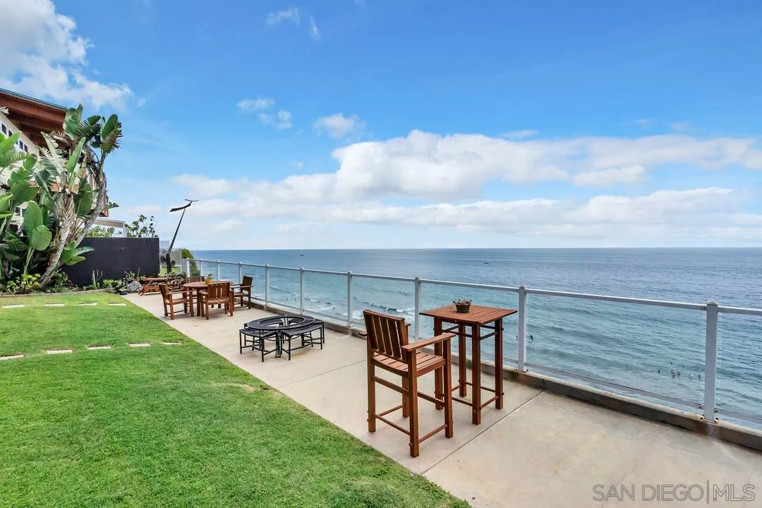 796 Neptune Avenue Encinitas, CA 92024 - Photo 38 of 49 a view of a chairs and table in the patio