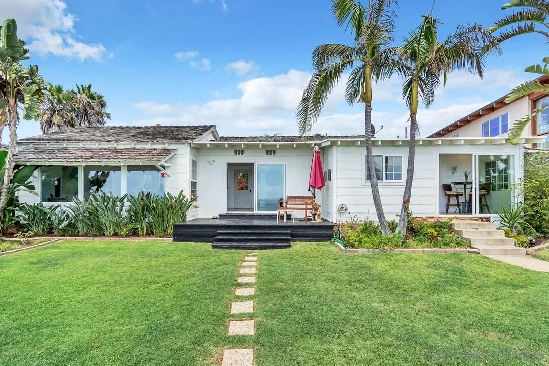 796 Neptune Avenue Encinitas, CA 92024 - Photo 41 of 49 a front view of house with yard and green space