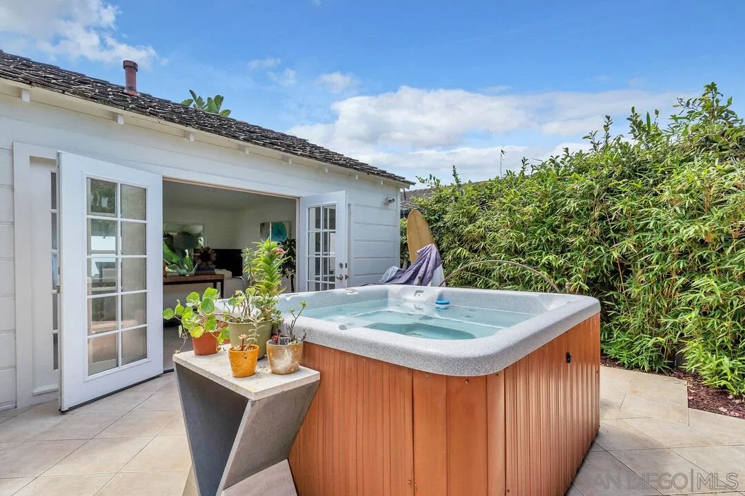 796 Neptune Avenue Encinitas, CA 92024 - Photo 43 of 49 a view of kitchen with dining table and chairs