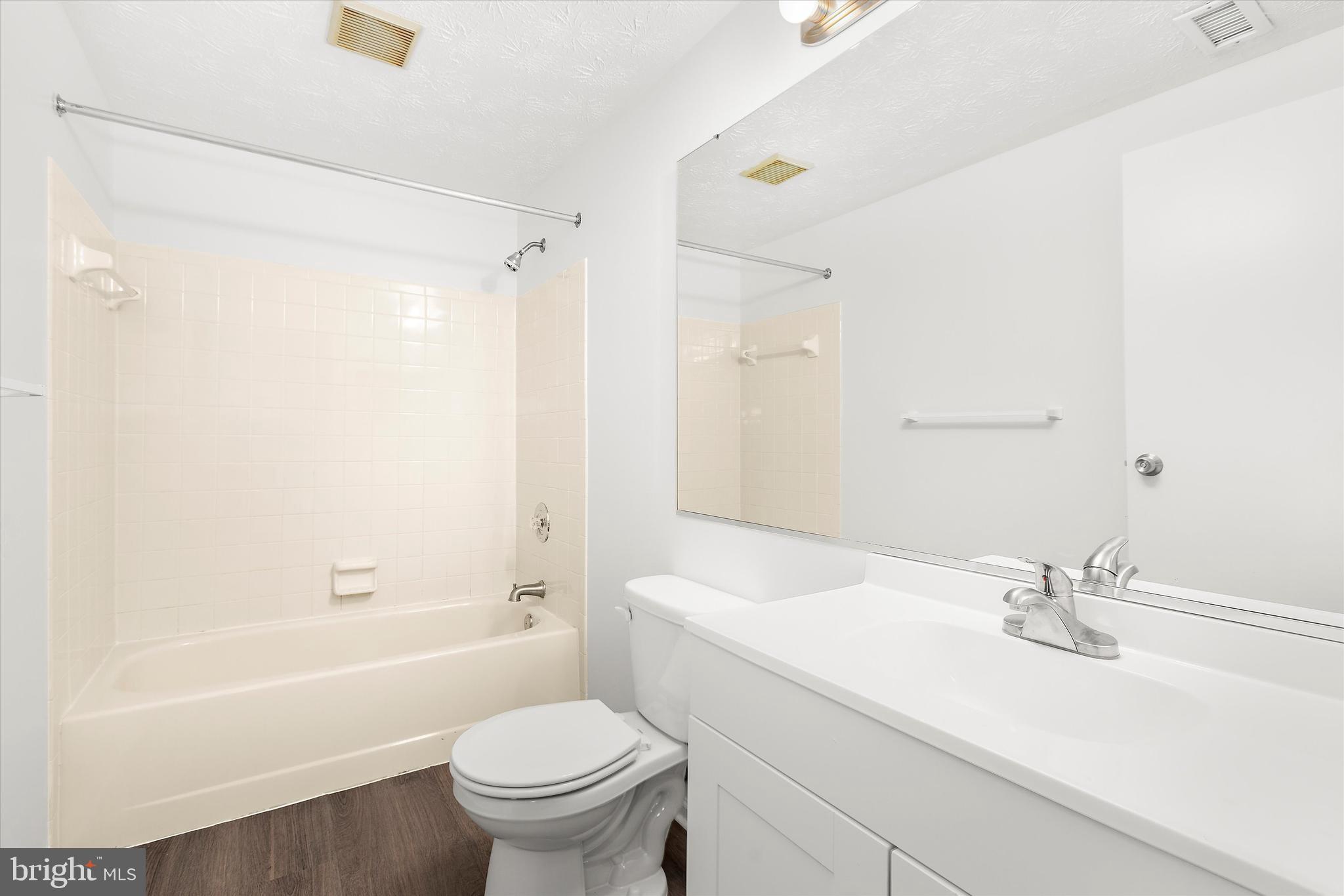 5920 Watch Chain Way, Unit 5102 Columbia, MD 21044 - Photo 18 of 29 a bathroom with a sink toilet and shower