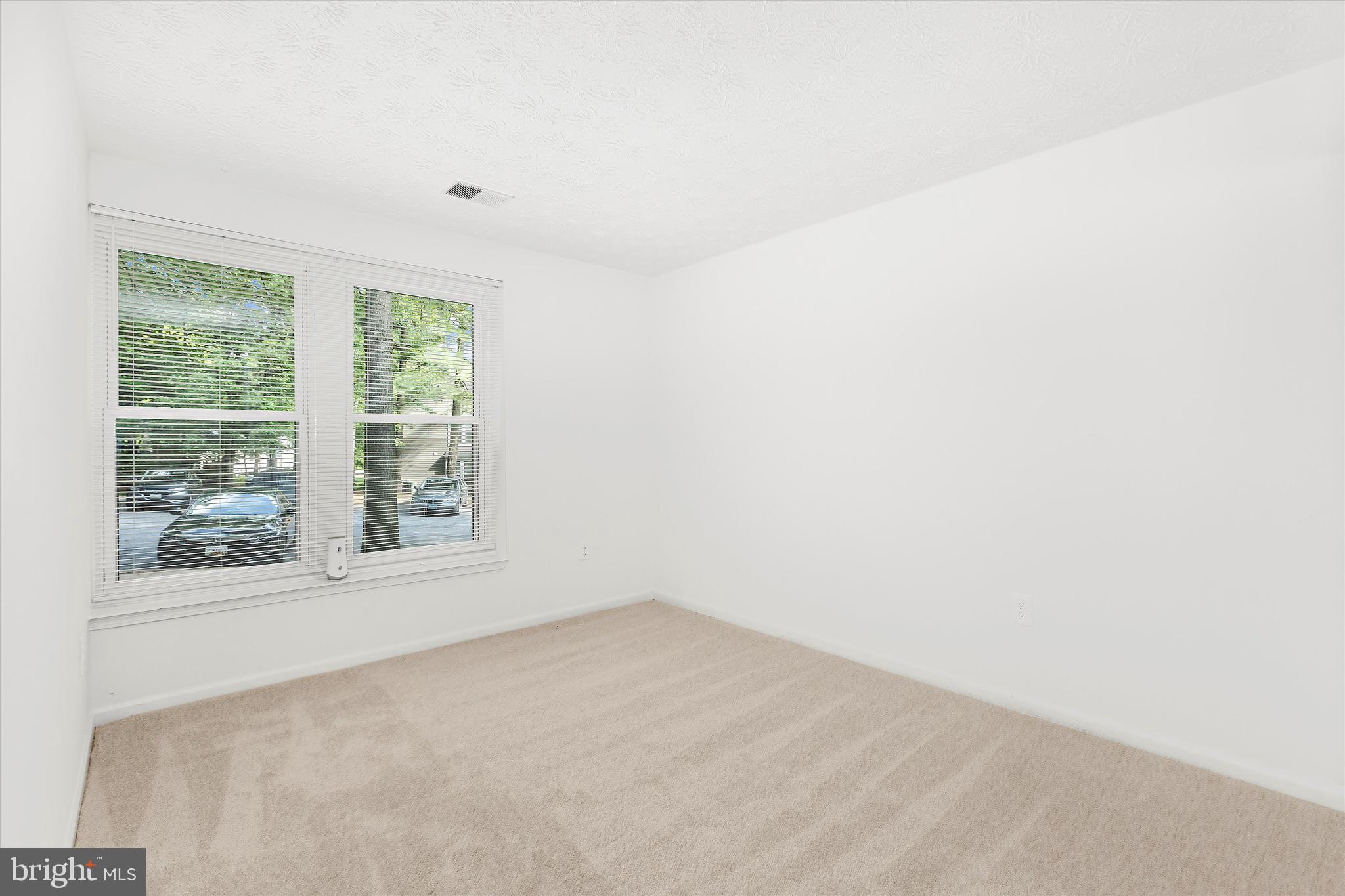 5920 Watch Chain Way, Unit 5102 Columbia, MD 21044 - Photo 19 of 29 an empty room with a window