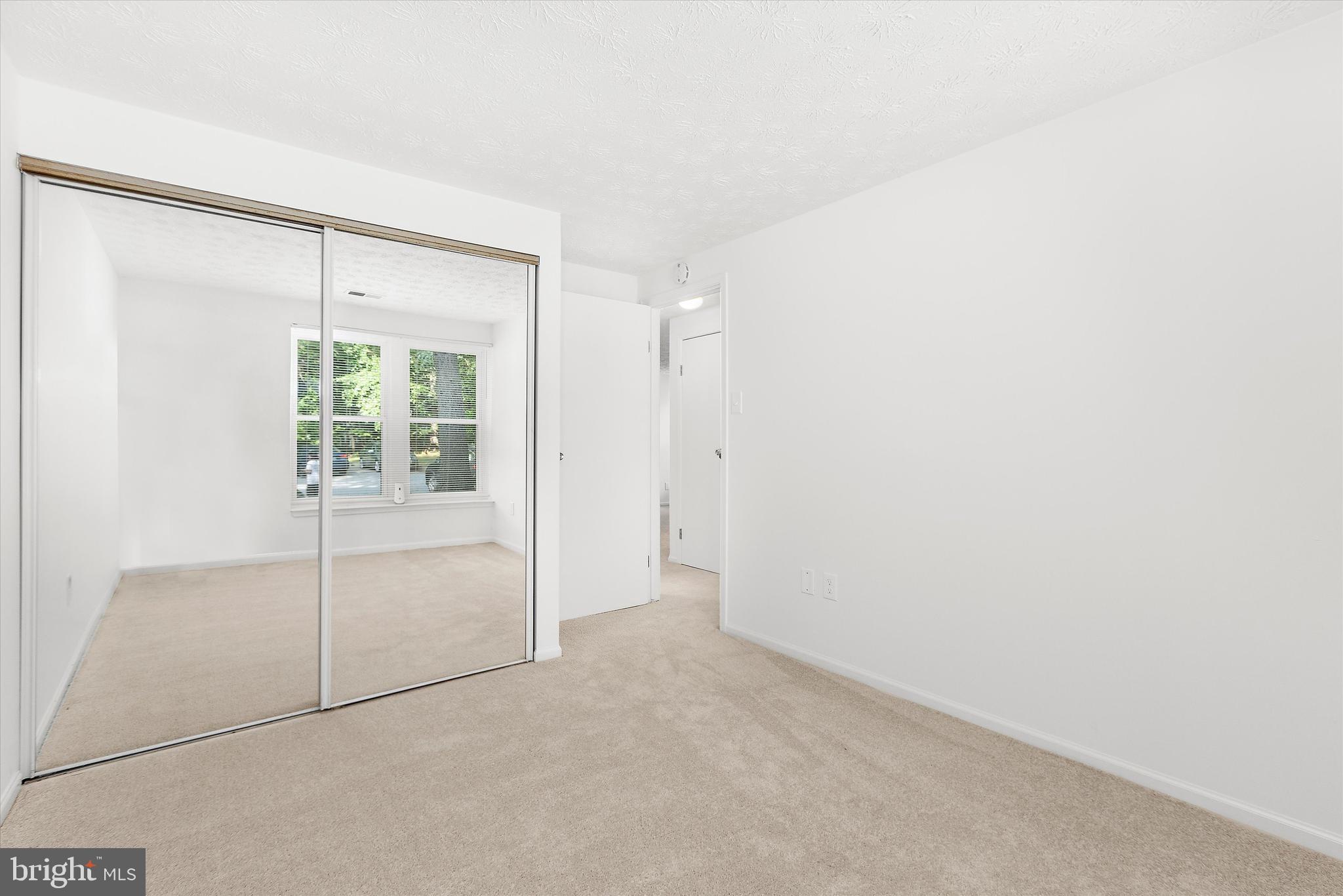 5920 Watch Chain Way, Unit 5102 Columbia, MD 21044 - Photo 20 of 29 a view of an empty room with a window