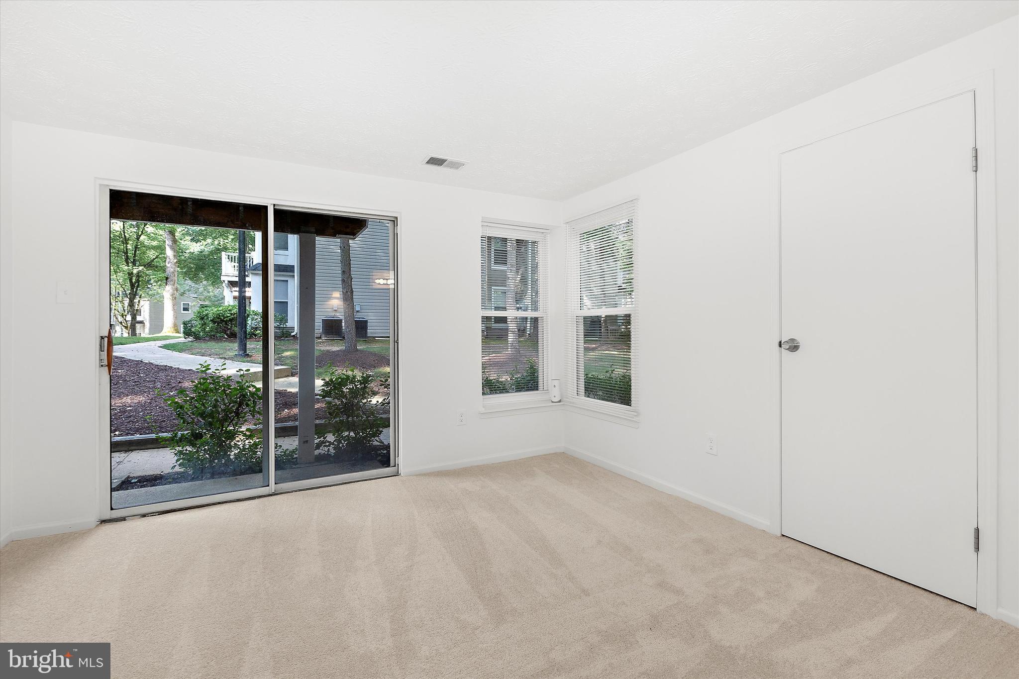 5920 Watch Chain Way, Unit 5102 Columbia, MD 21044 - Photo 22 of 29 an empty room with windows