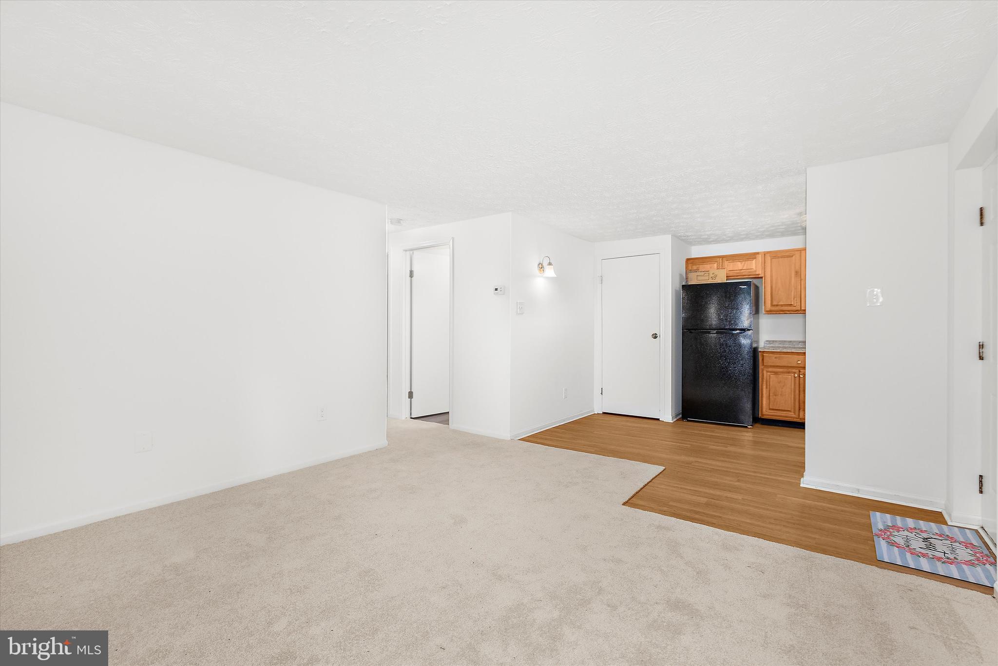 5920 Watch Chain Way, Unit 5102 Columbia, MD 21044 - Photo 5 of 29 a view of an empty room with an entryway