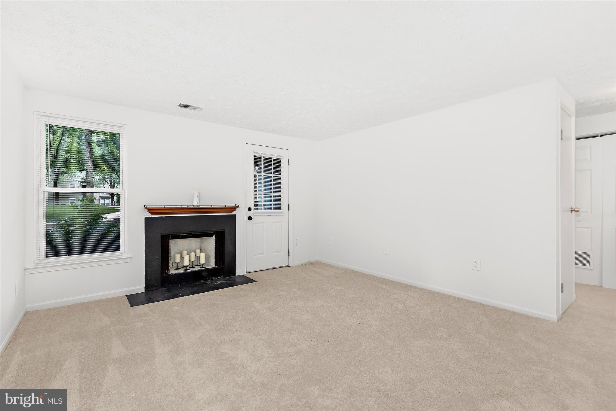 5920 Watch Chain Way, Unit 5102 Columbia, MD 21044 - Photo 6 of 29 a view of an empty room with a window