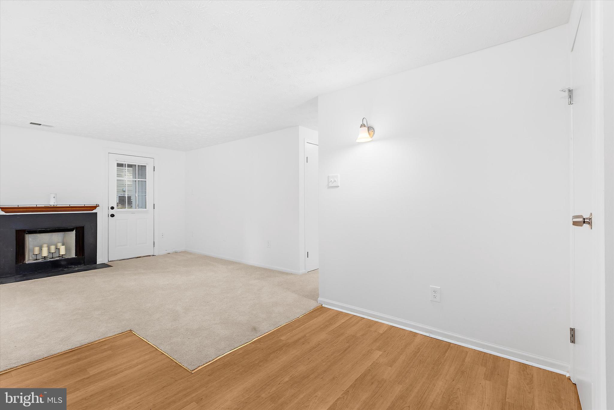 5920 Watch Chain Way, Unit 5102 Columbia, MD 21044 - Photo 10 of 29 a view of empty room with wooden floor