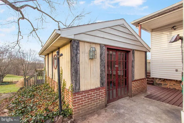 a view of a room with windows