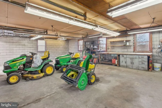 a view of a garage with cars