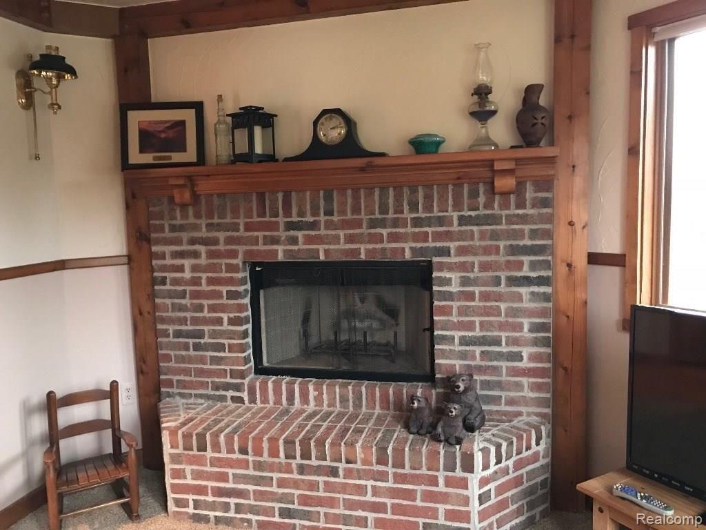3850 West Oregon Road Lapeer, MI 48446 - Photo 37 of 94 Den fireplace.