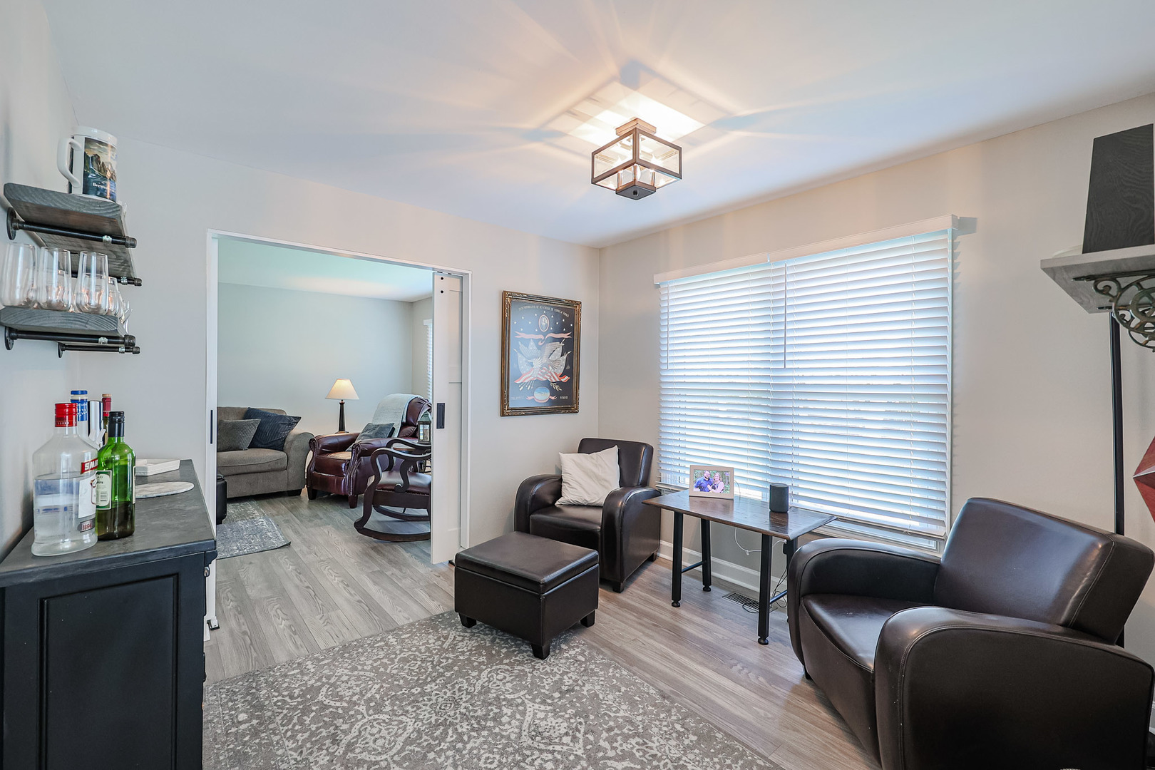 135 Cinderford Drive Oswego, IL 60543 - Photo 14 of 32 a living room with furniture and a window