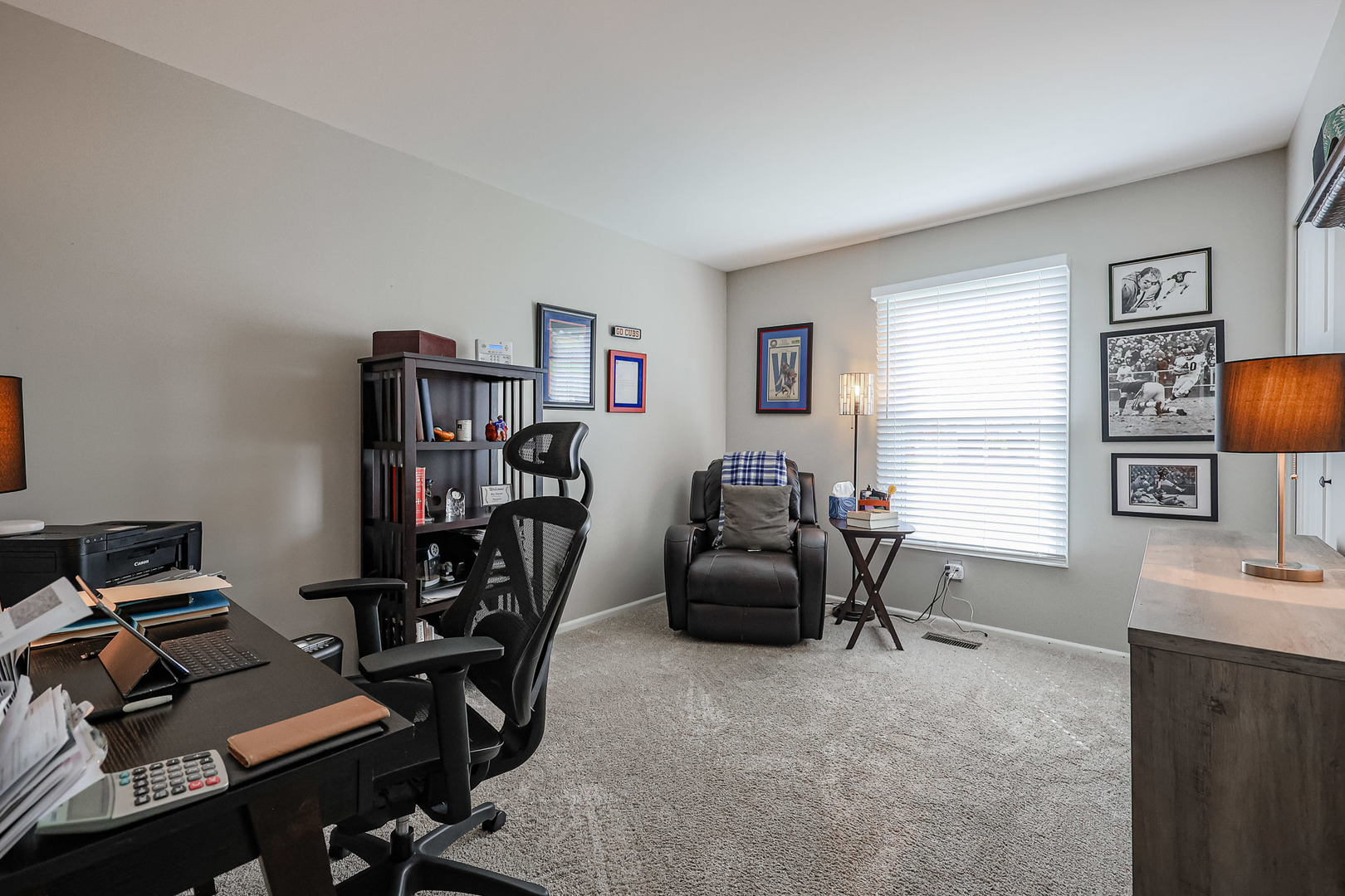 135 Cinderford Drive Oswego, IL 60543 - Photo 21 of 32 a view of a workspace with furniture and a window