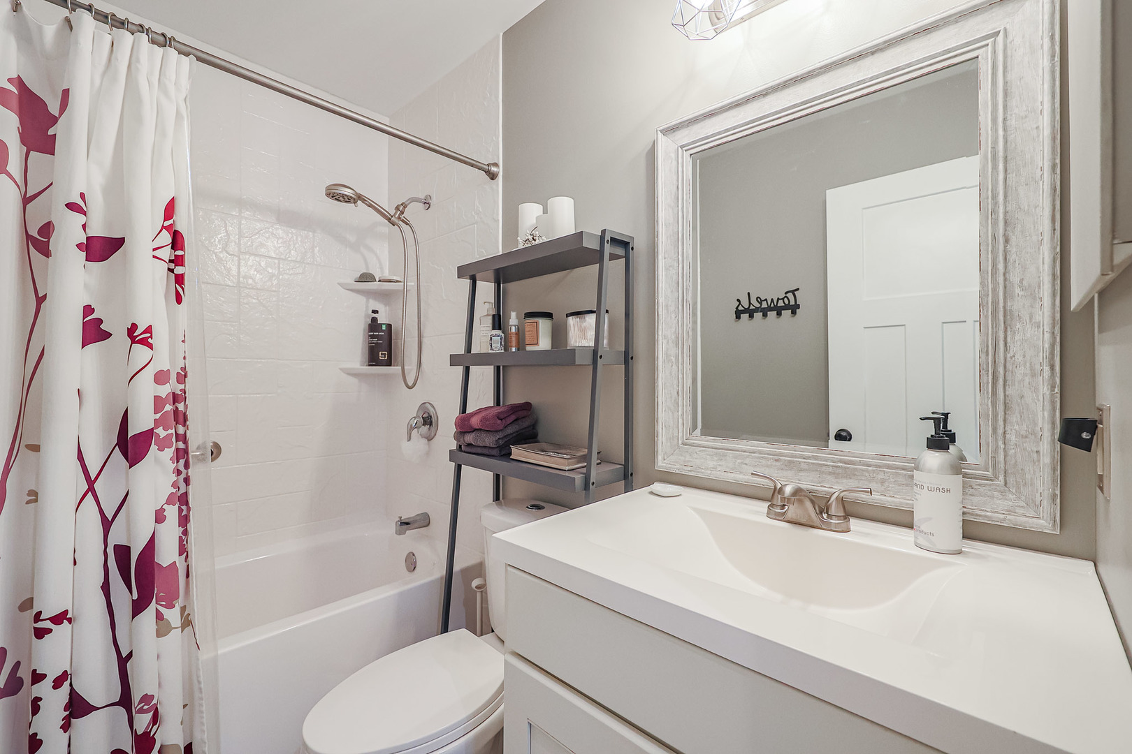 135 Cinderford Drive Oswego, IL 60543 - Photo 23 of 32 a bathroom with a sink toilet and shower