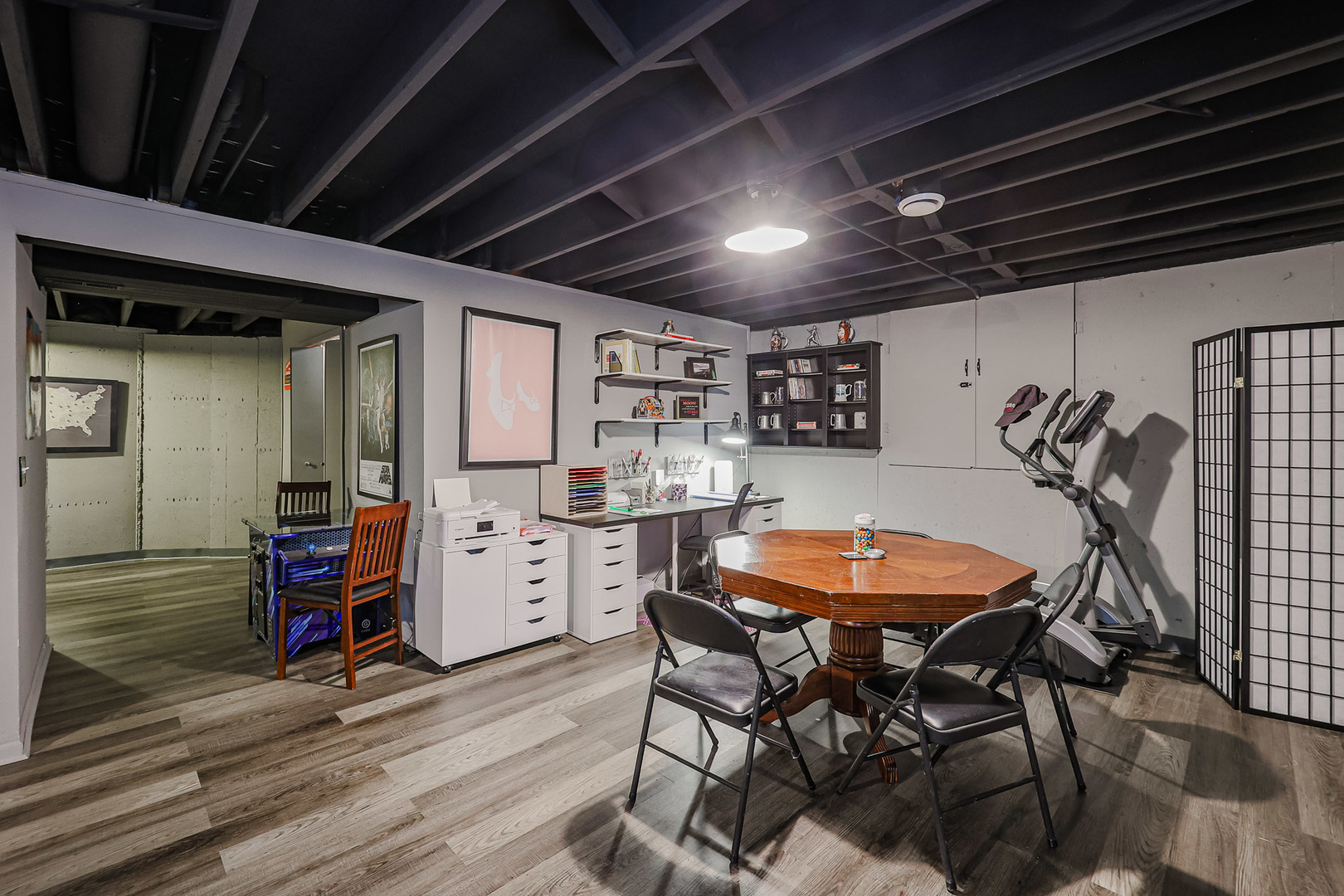 135 Cinderford Drive Oswego, IL 60543 - Photo 26 of 32 a room with furniture and wooden floors
