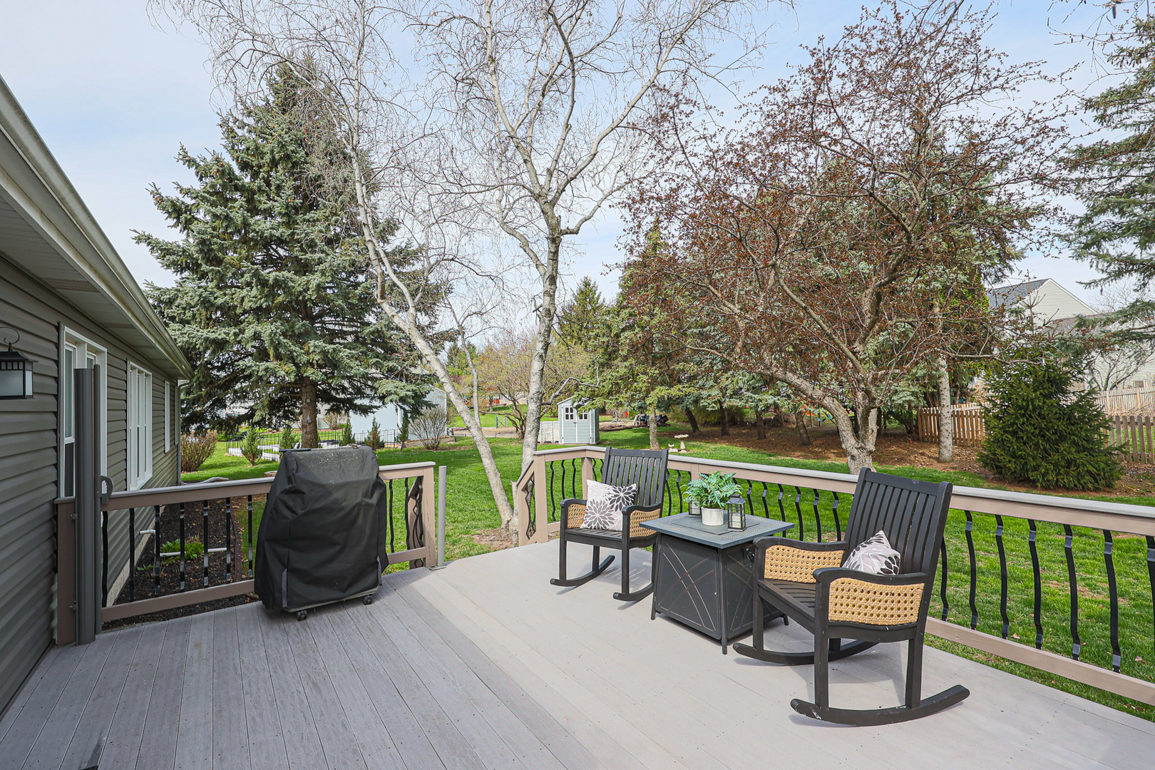 135 Cinderford Drive Oswego, IL 60543 - Photo 28 of 32 a view of a two chairs in the roof deck