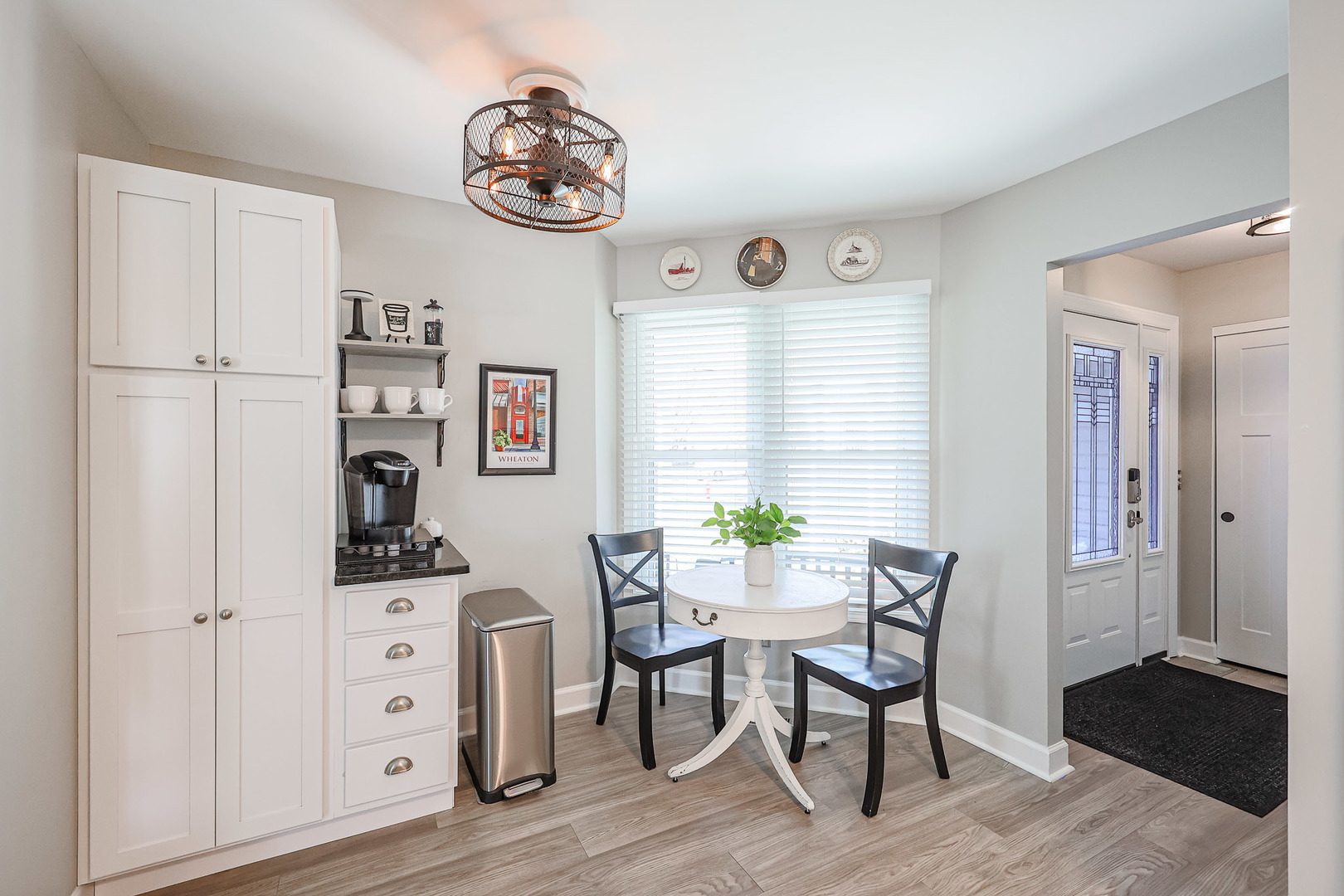 135 Cinderford Drive Oswego, IL 60543 - Photo 10 of 32 a view of a dining room with furniture and wooden floor