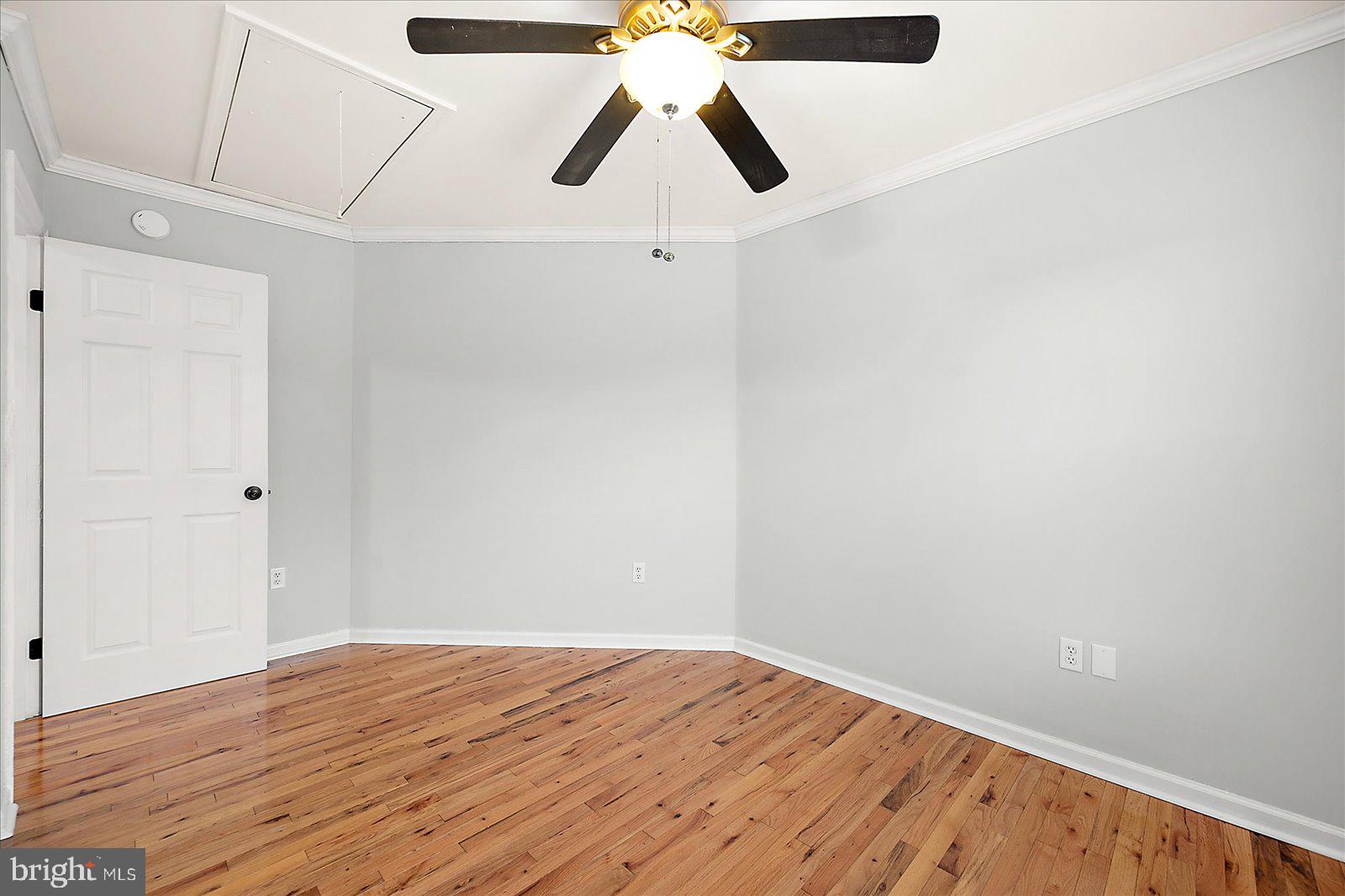 36405 Poplar Neck Road Willards, MD 21874 - Photo 34 of 50 a view of an empty room with wooden floor