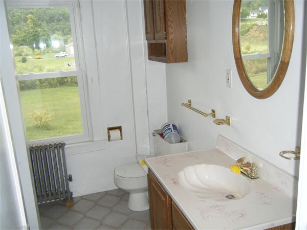 3 Bethany Road Monson, MA 01057 - Photo 13 of 16 a bathroom with a sink and a mirror