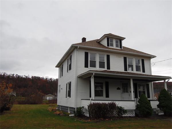 3 Bethany Road Monson, MA 01057 - Photo 2 of 16 a front view of a house with a yard