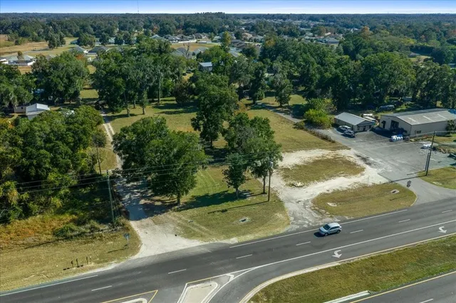 a view of a lake with a yard