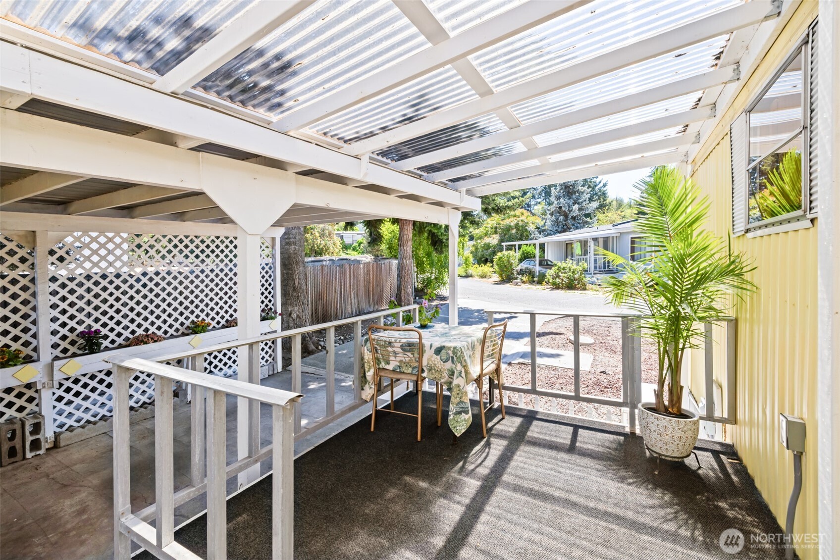 921 South 3rd Avenue, Unit 20 Sequim, WA 98382 - Photo 11 of 37 a view of a balcony with furniture