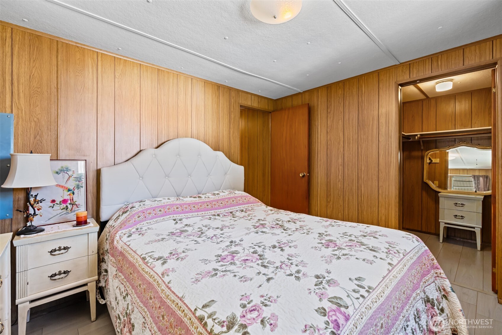 921 South 3rd Avenue, Unit 20 Sequim, WA 98382 - Photo 18 of 37 a bedroom with a bed and a dresser