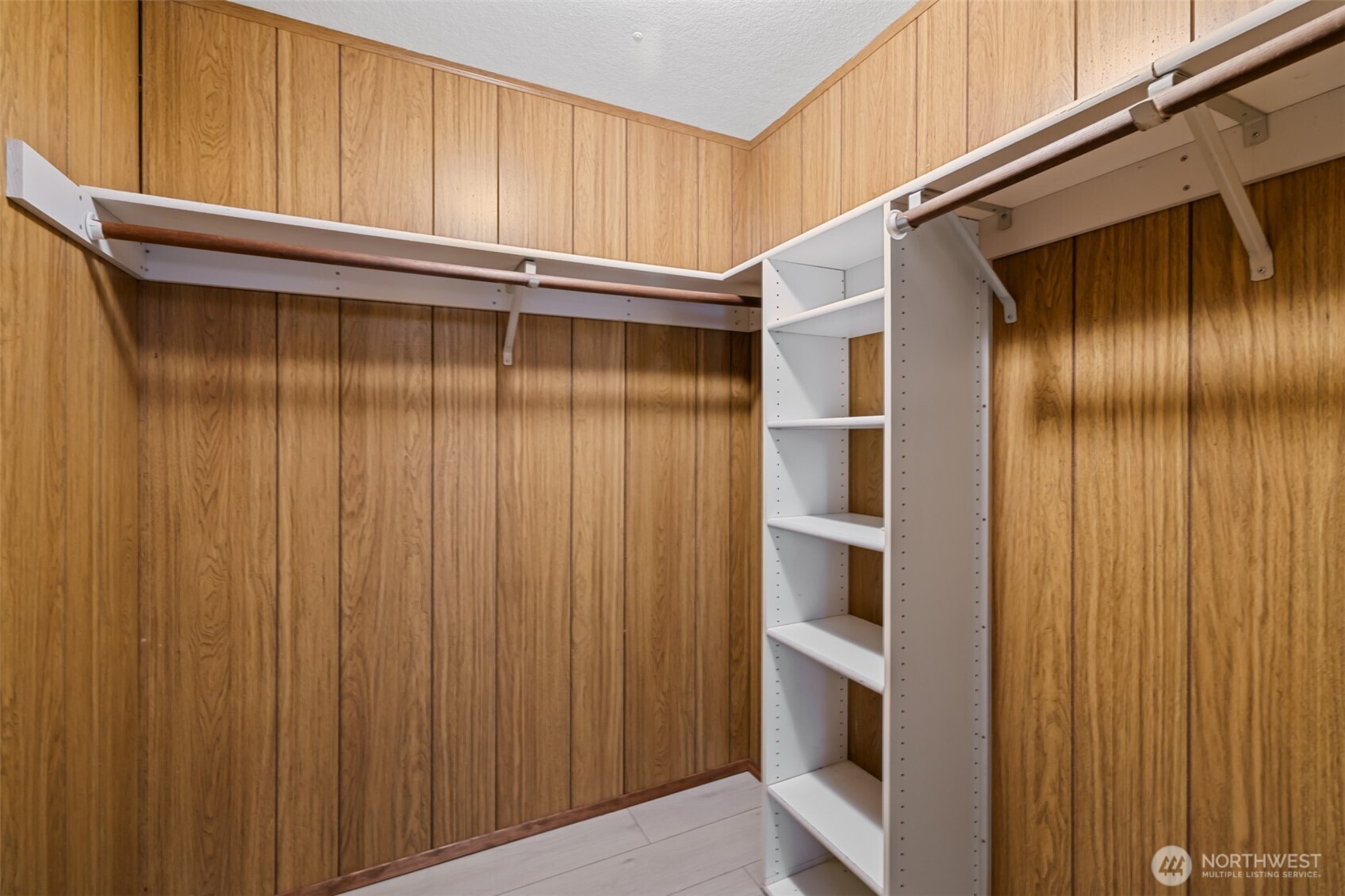 921 South 3rd Avenue, Unit 20 Sequim, WA 98382 - Photo 22 of 37 a view of an empty room with a wooden walls