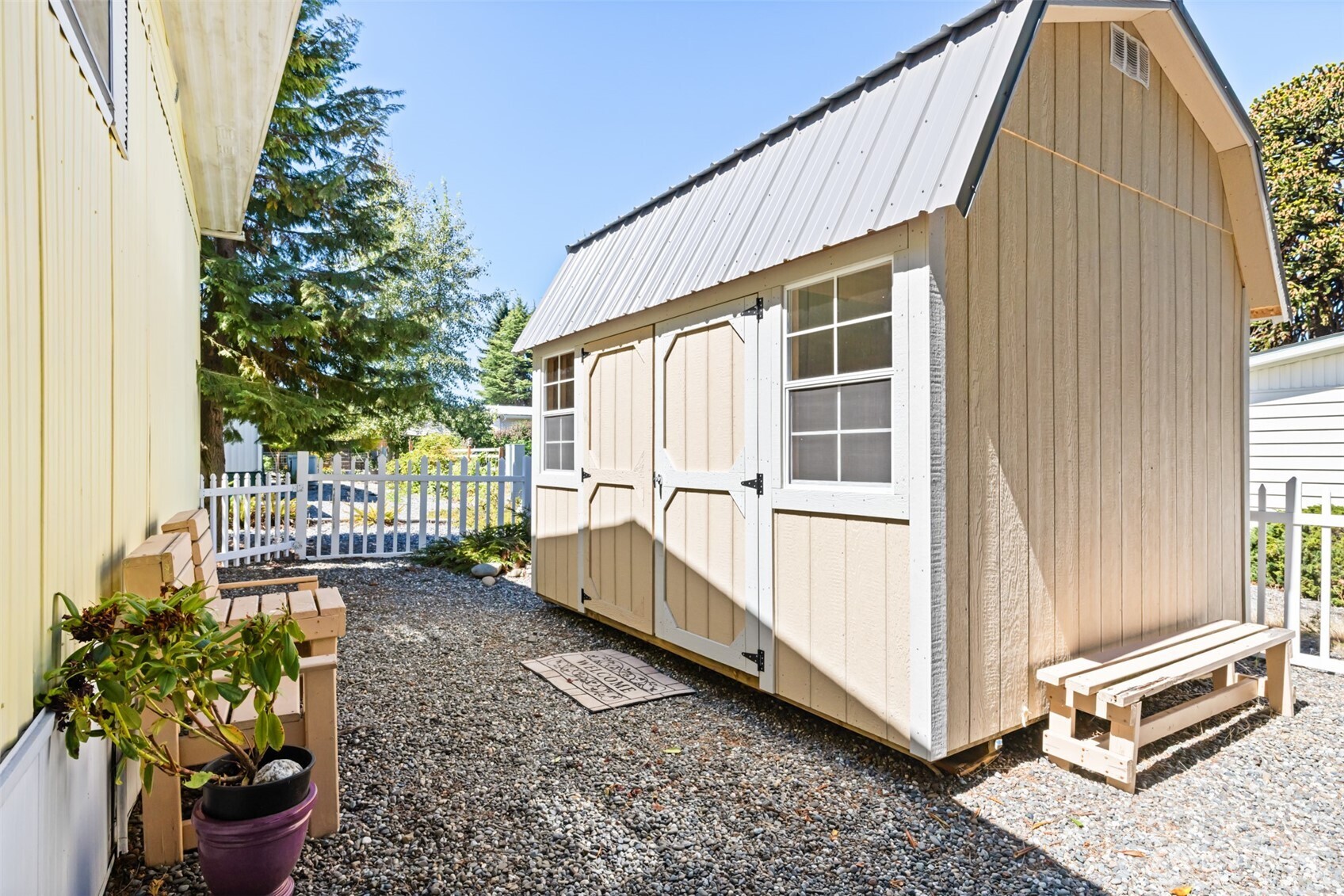 921 South 3rd Avenue, Unit 20 Sequim, WA 98382 - Photo 4 of 37 a view of a house with a yard