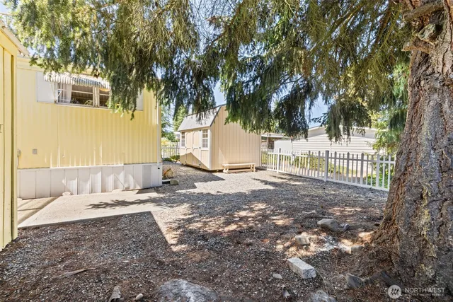 a view of a backyard of the house