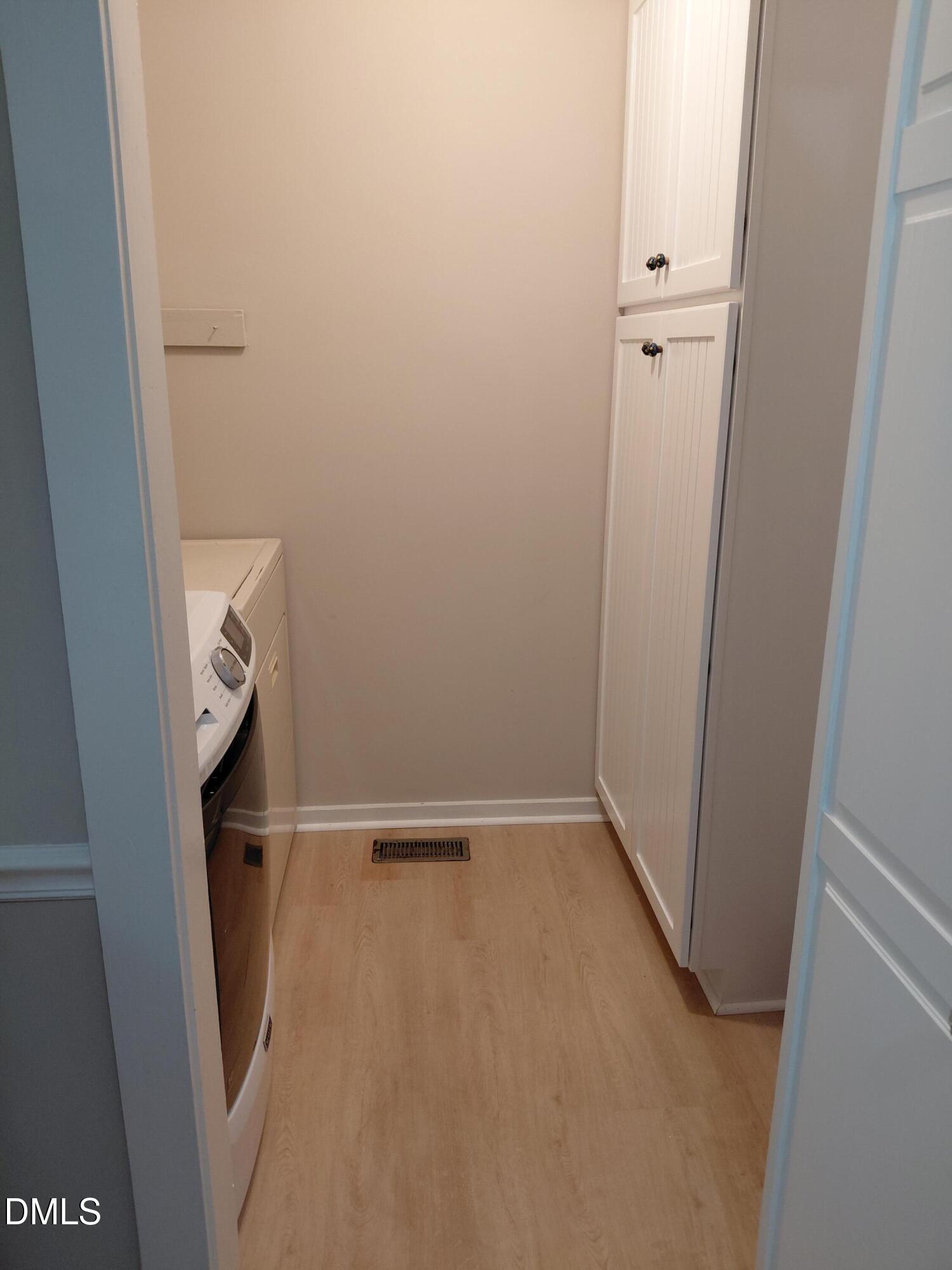 804 Olive Street Apex, NC 27502 - Photo 54 of 60 a view of hallway with stairs