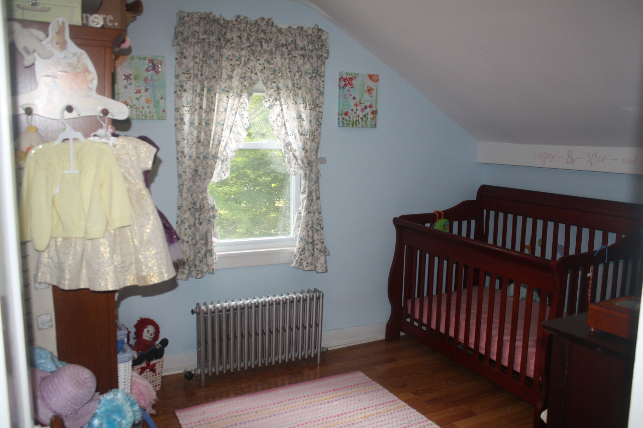 13 Glendale Road Stockbridge, MA 01262 - Photo 10 of 10 a bedroom with a bed and a window
