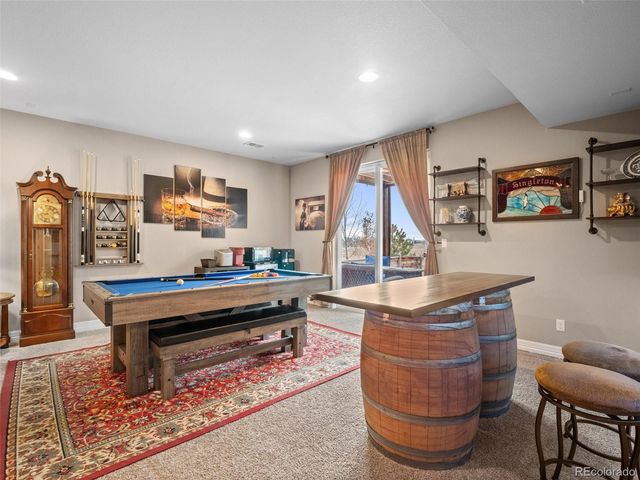 a room with furniture and painting on the wall