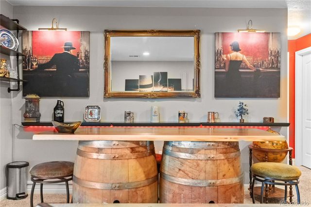 a bathroom with a granite countertop toilet sink and shower