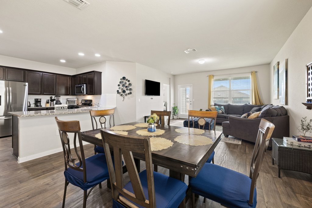 204 Rochester Lane Hutto, TX 78634 - Photo 15 of 40 Dining area featuring dark wood-type flooring