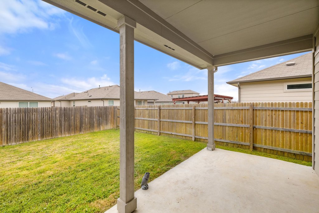 204 Rochester Lane Hutto, TX 78634 - Photo 34 of 40 Fenced backyard featuring a patio