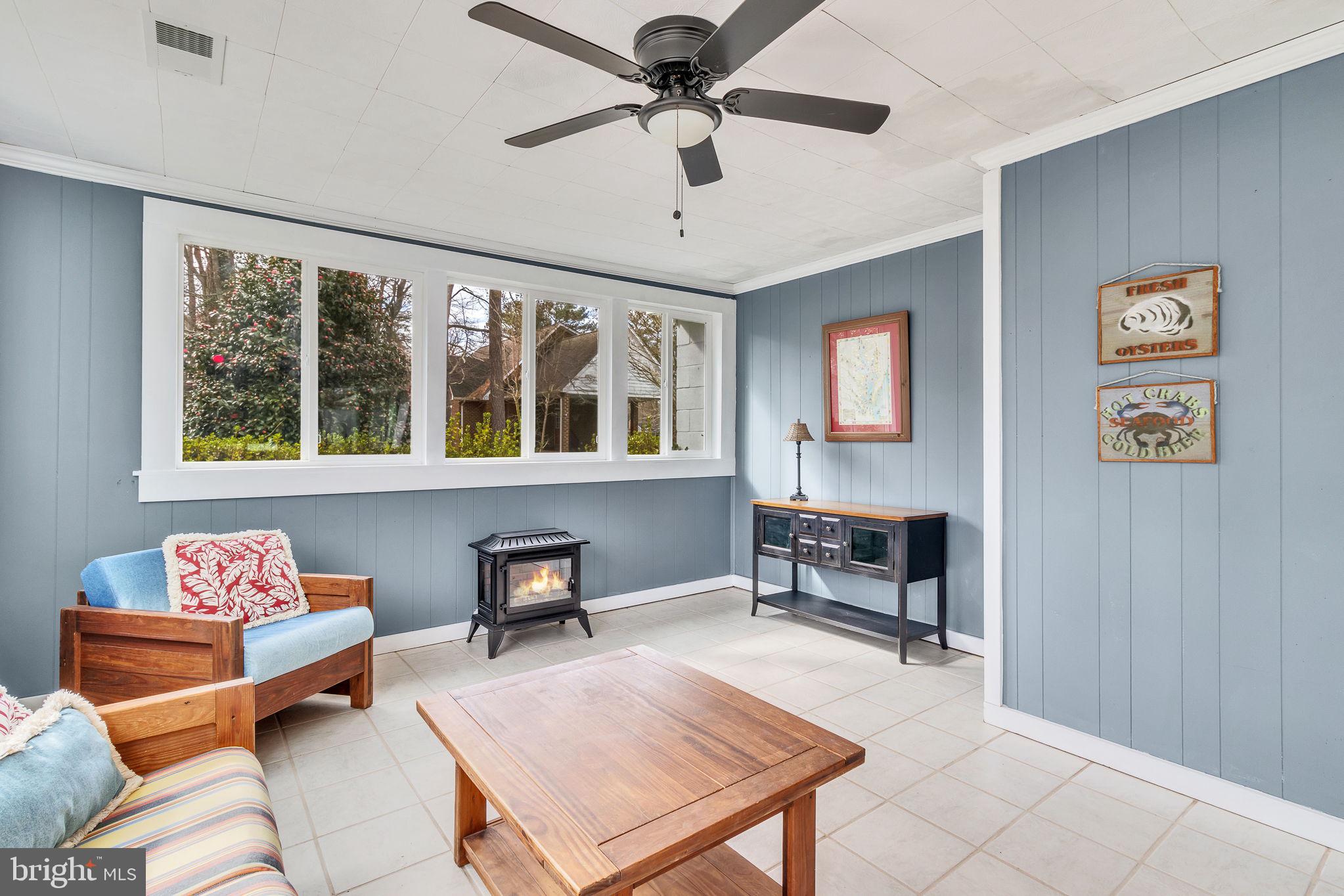 239 Lane Road Reedville, VA 22539 - Photo 15 of 43 Bright and inviting sunroom retreat.