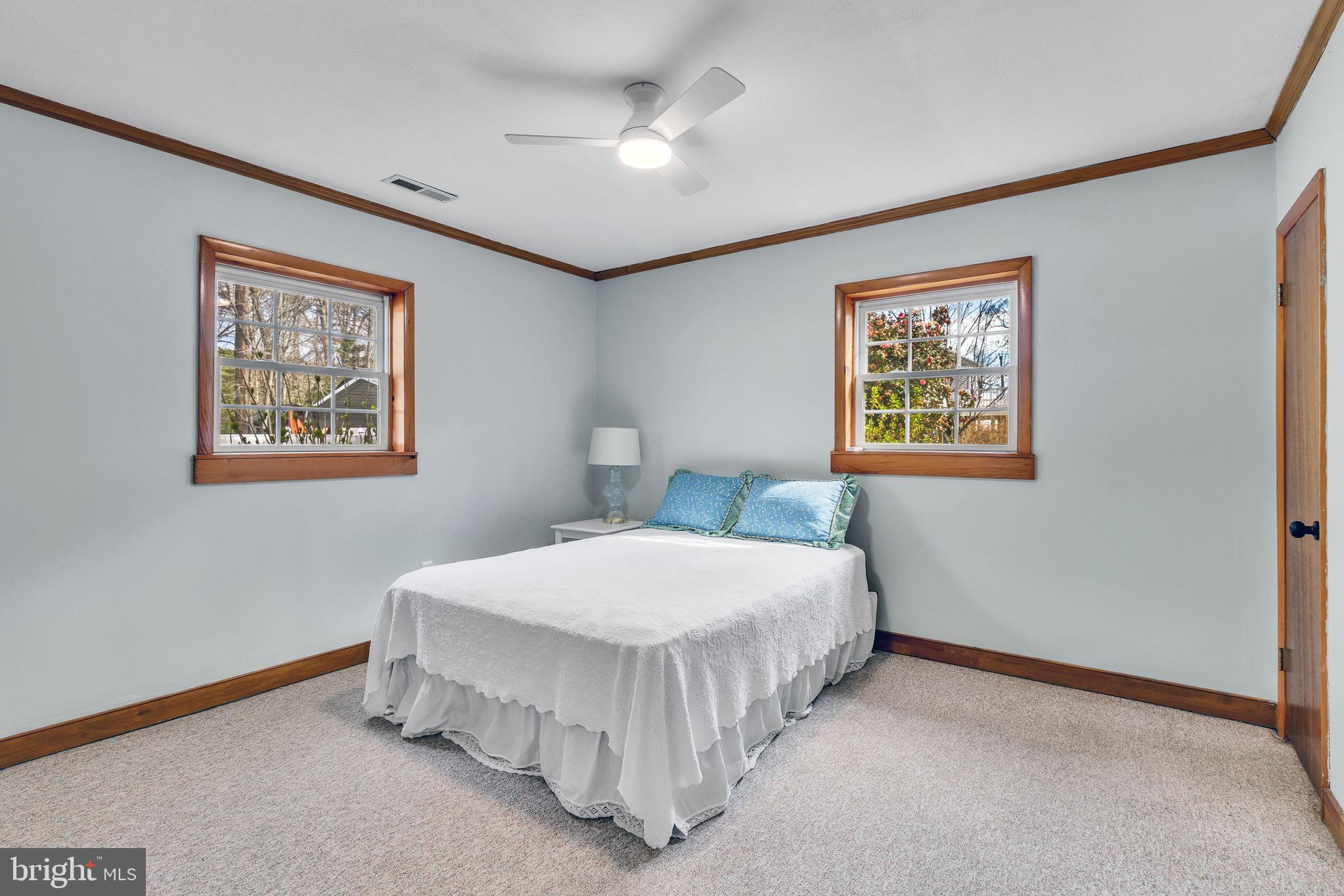 239 Lane Road Reedville, VA 22539 - Photo 22 of 43 Bright and airy bedroom retreat.