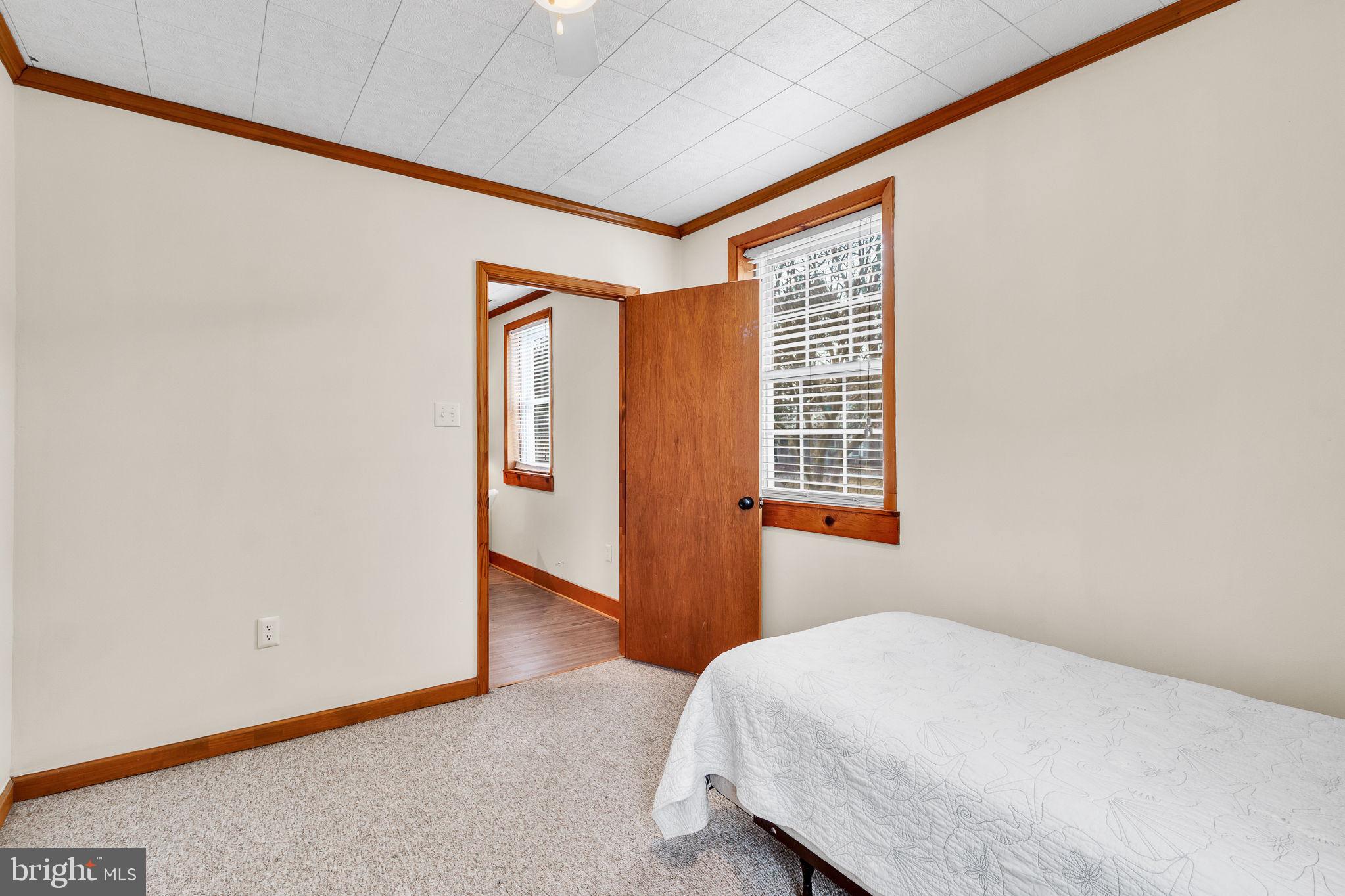 239 Lane Road Reedville, VA 22539 - Photo 24 of 61 Bright and inviting bedroom retreat.