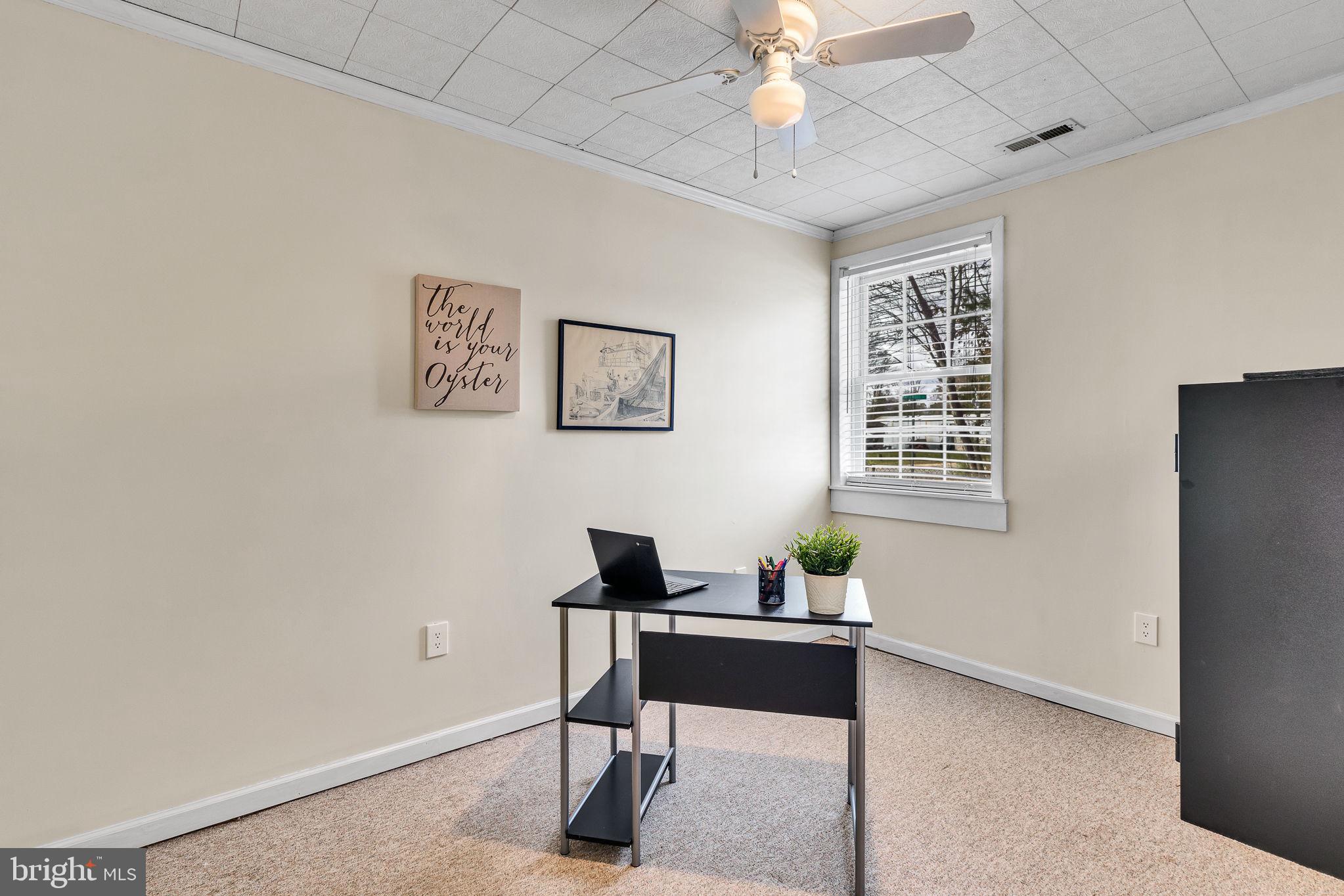 239 Lane Road Reedville, VA 22539 - Photo 33 of 61 a workspace with furniture and window