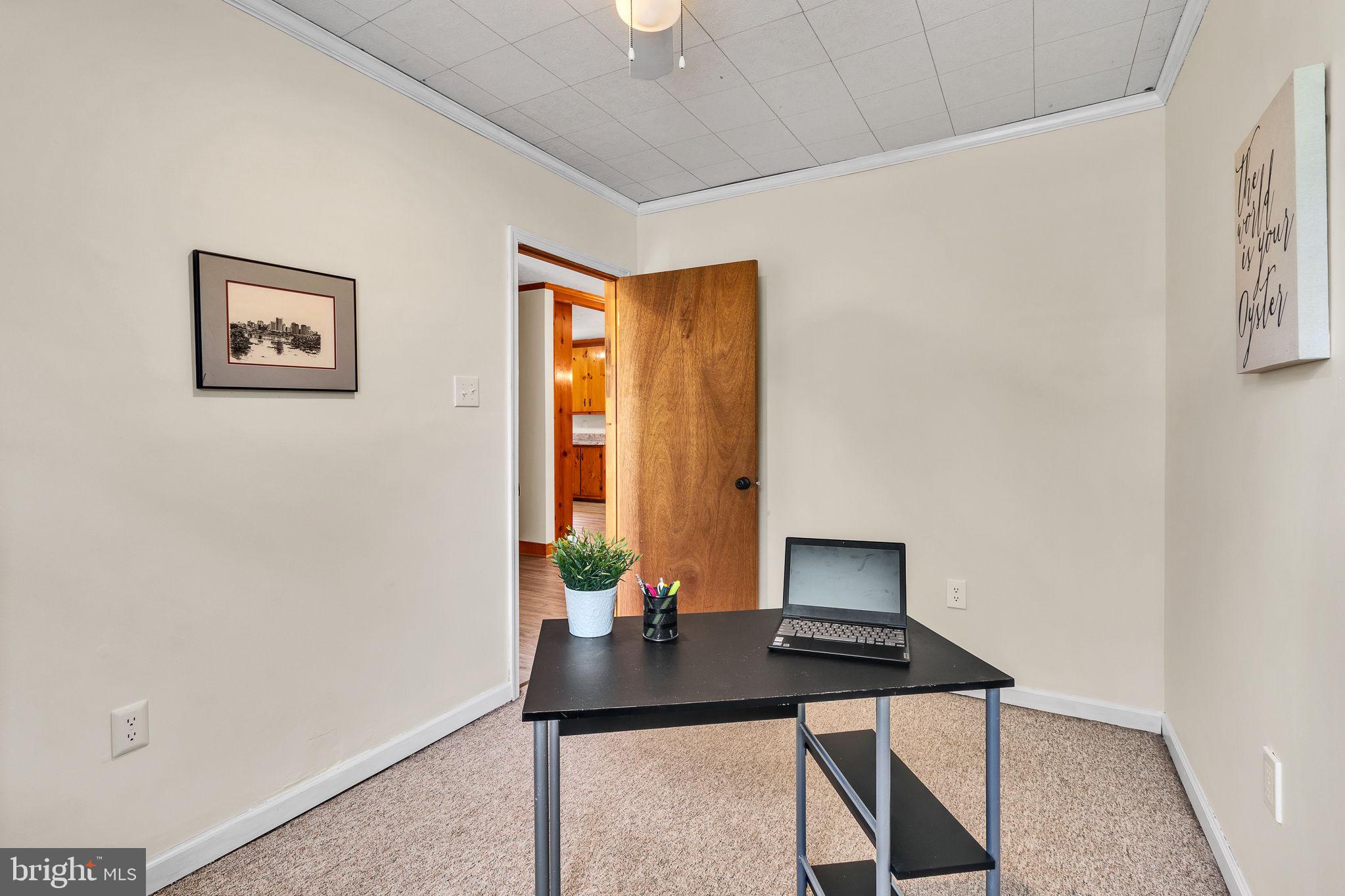 239 Lane Road Reedville, VA 22539 - Photo 34 of 61 Cozy workspace with inviting charm.