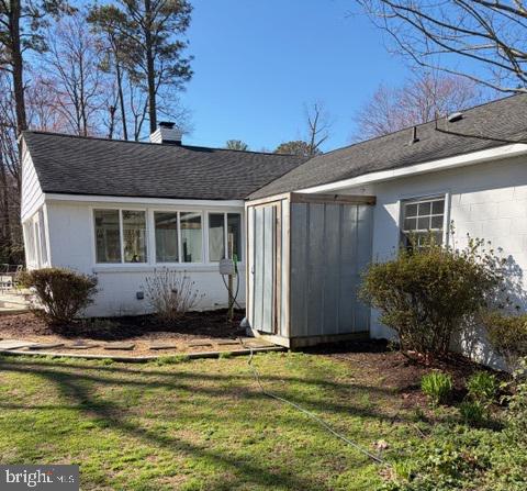 239 Lane Road Reedville, VA 22539 - Photo 36 of 43 Charming home with serene outdoor space.