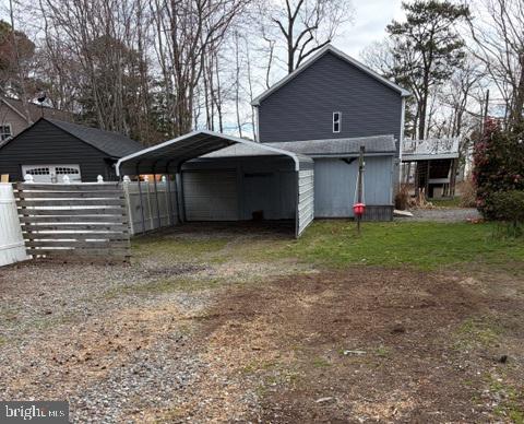 239 Lane Road Reedville, VA 22539 - Photo 39 of 43 Spacious outdoor area with carport.