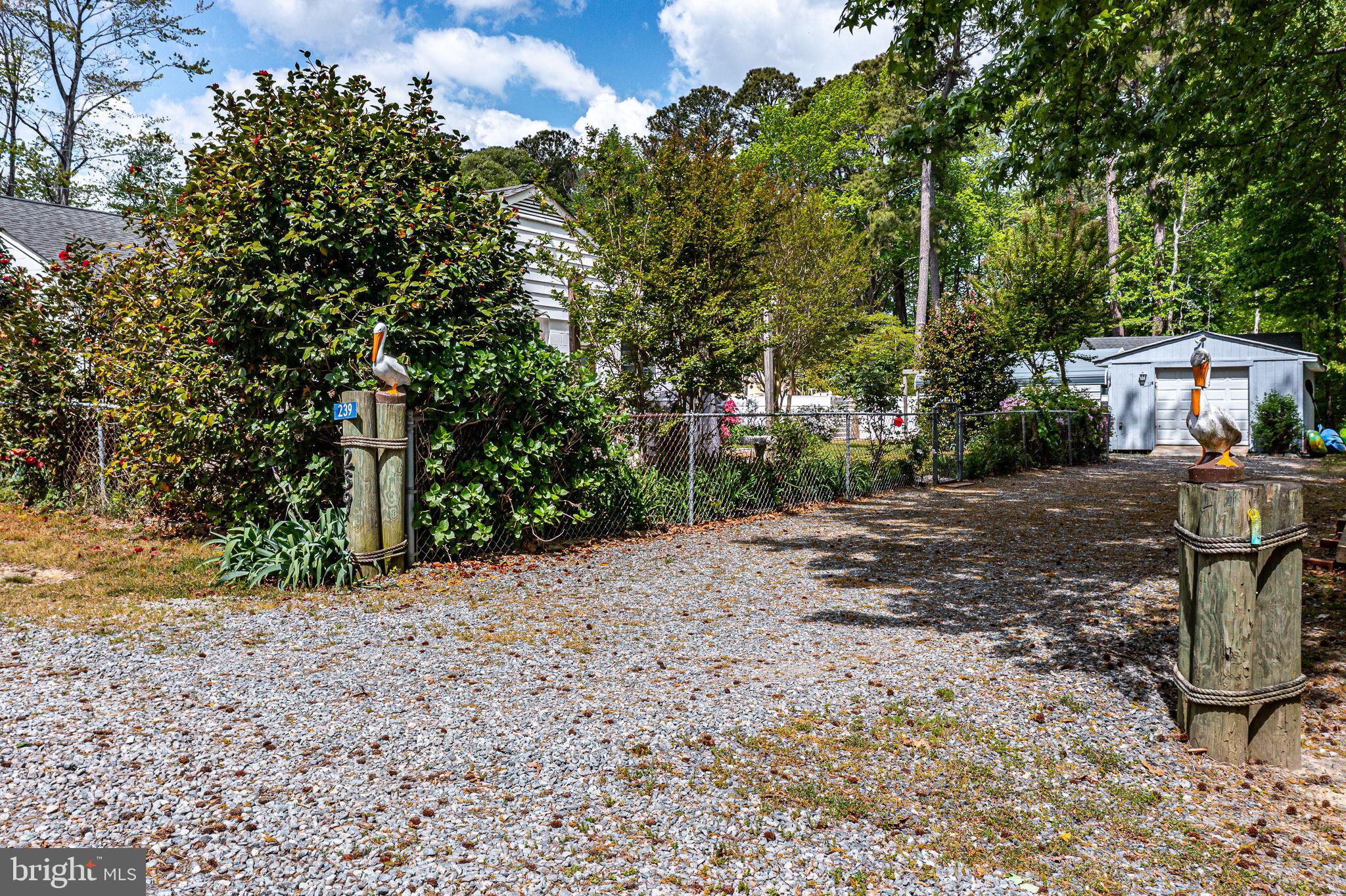 239 Lane Road Reedville, VA 22539 - Photo 49 of 61 a view of a backyard with sitting area