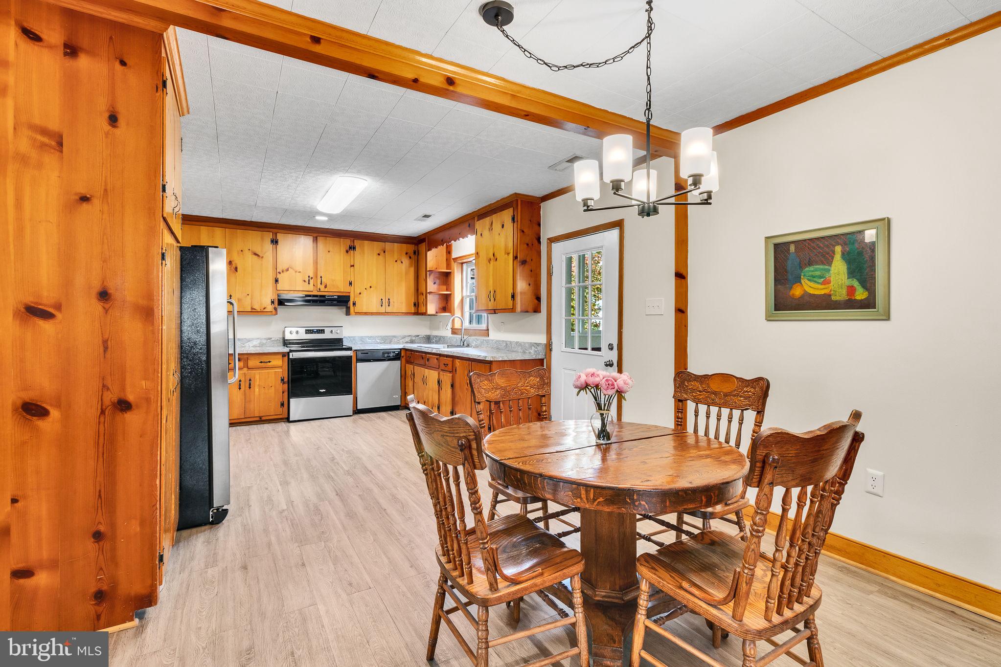 239 Lane Road Reedville, VA 22539 - Photo 10 of 43 Cozy kitchen with rustic charm.