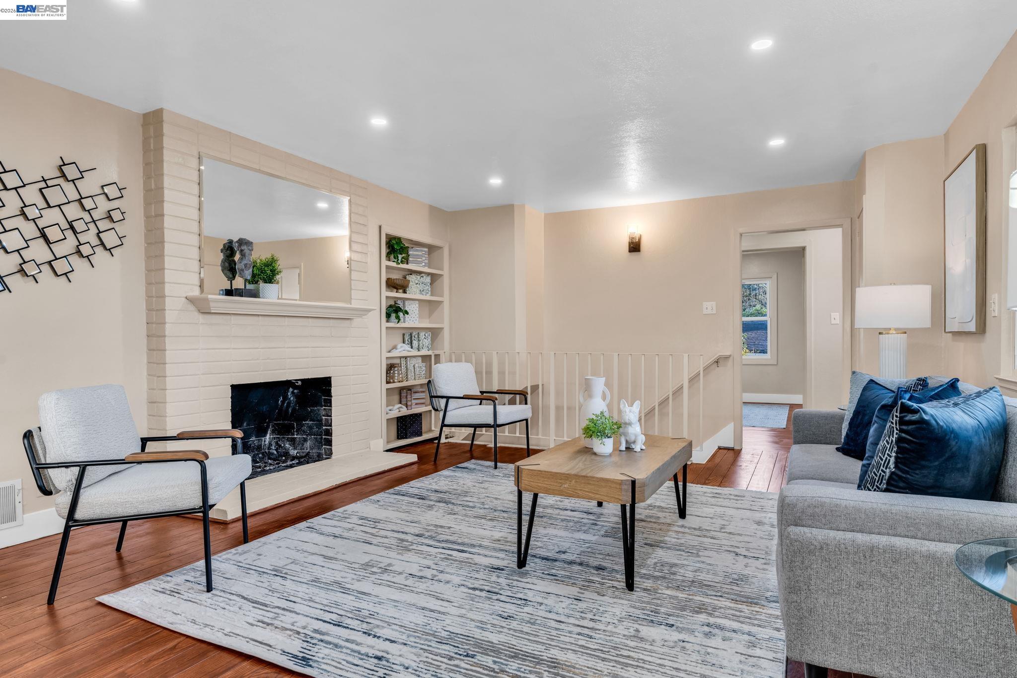 4628 Fieldbrook Road Oakland, CA 94619 - Photo 22 of 40 a living room with furniture and a fireplace